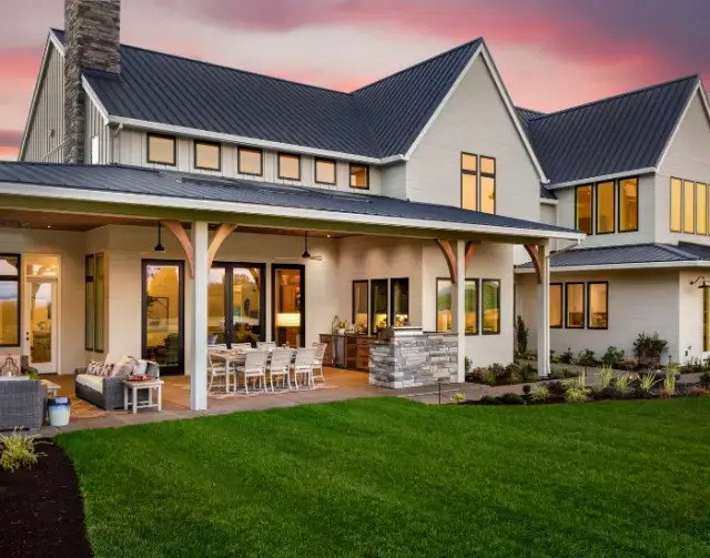 a house with designer/luxury shingles roofing