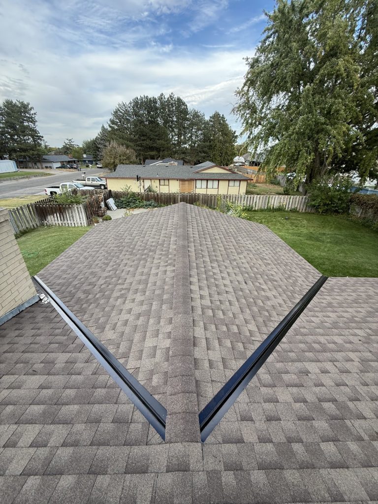 Completed roof replacement over the garage of a south Kennewick home, GAF Timberline NS in Barkwood